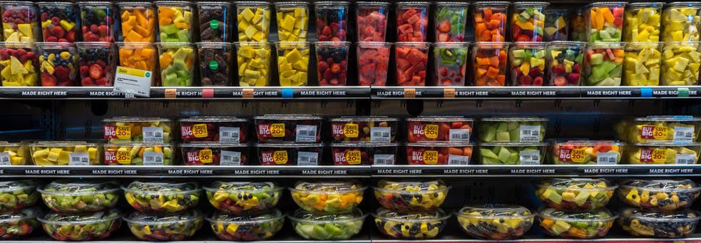 supermarket fruit in plastic packaging